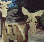 opera di Michelangeli, asino in legno